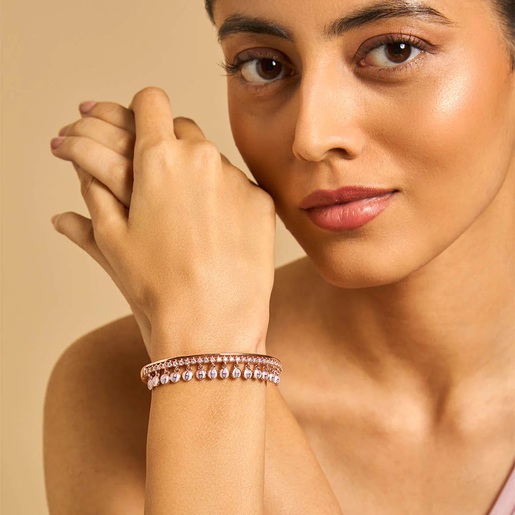 Meenakari Zircon Kada embodies a blend of modern