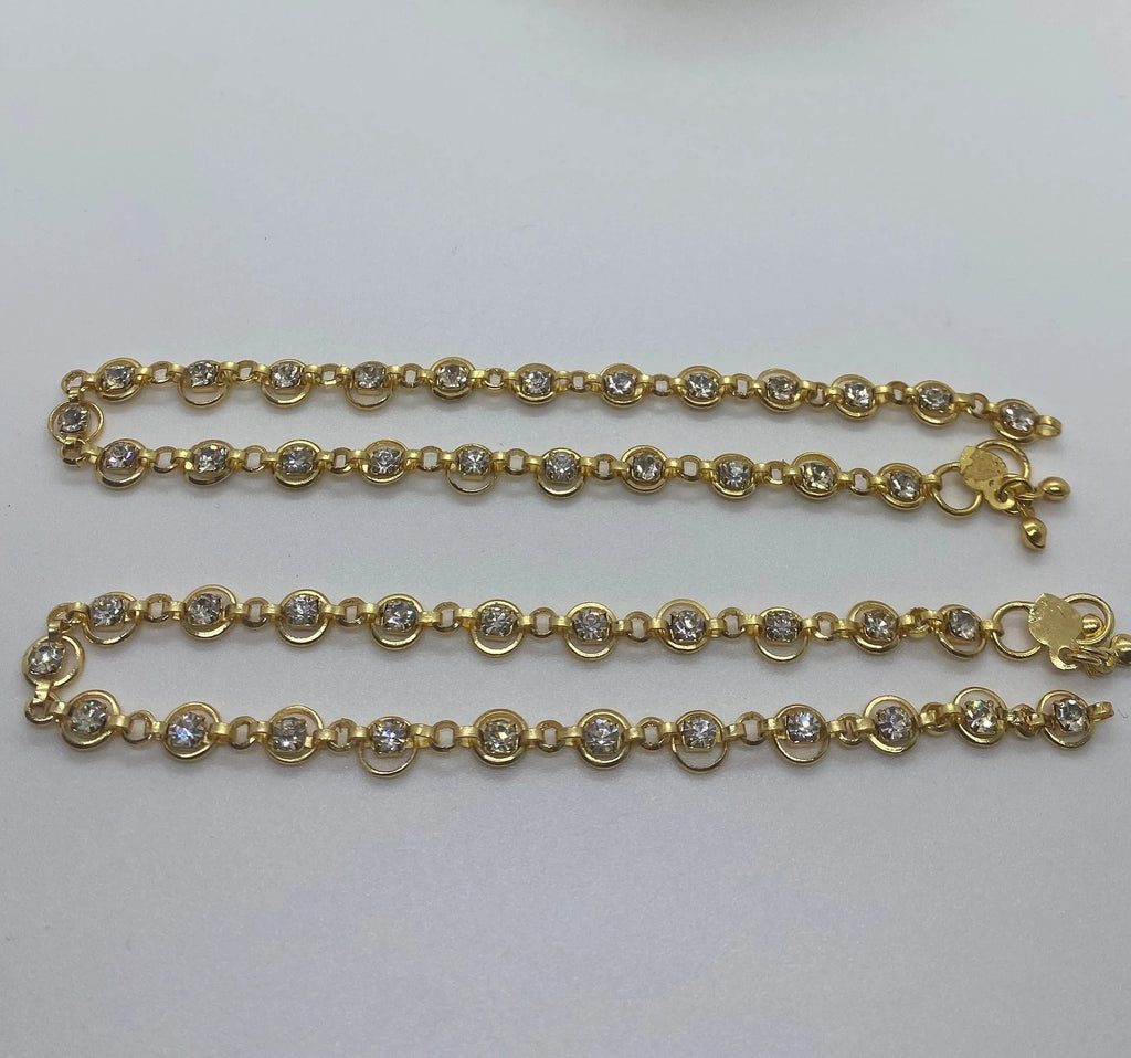 Bollywood jewellery, gold color anklets. Indian jewelry