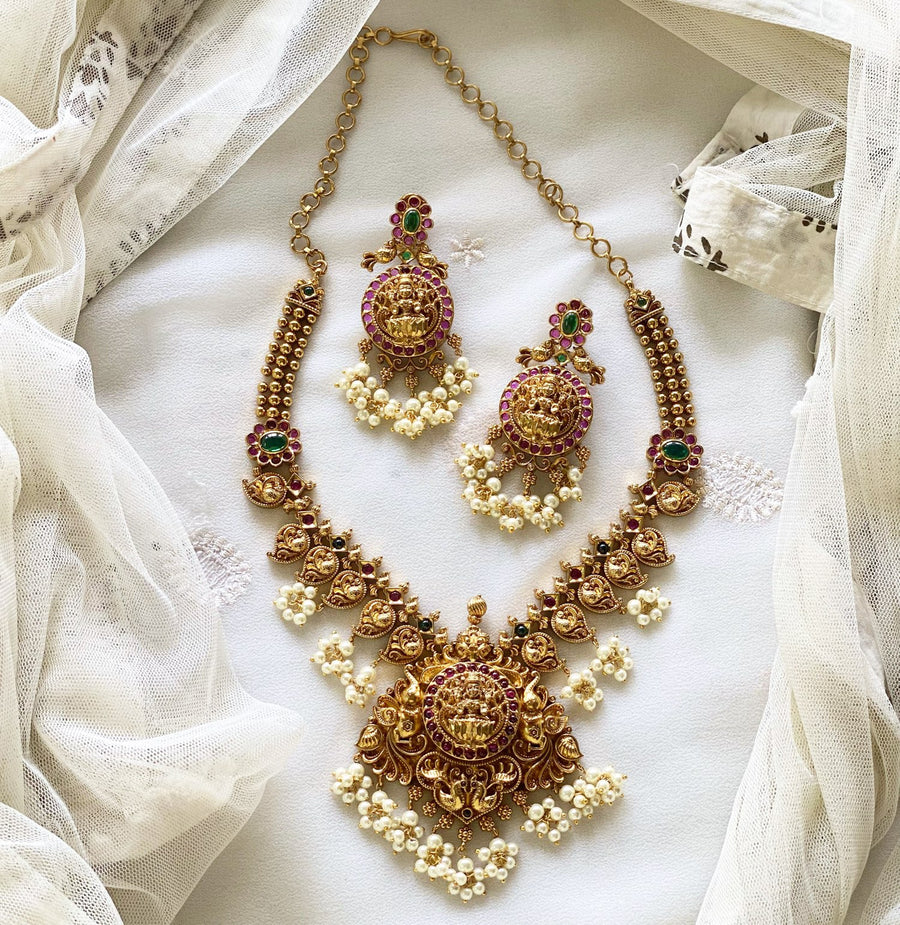 Antique matte laxshmi gajendra kemp short set Here's a descriptive overview