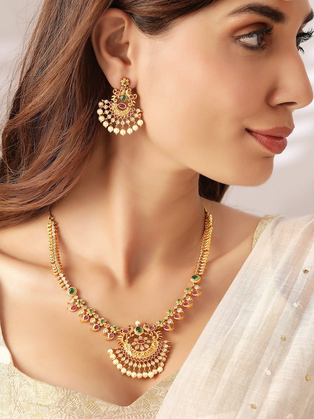 Gold-Plated Handcrafted Faux Ruby Temple Jewellery Set  to any wardrobe  advisable to avoid