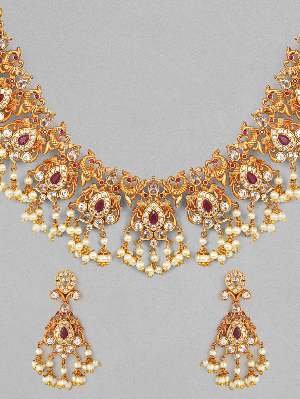 Gold Plated Handcrafted Ruby Stone with Pearls Traditional Necklace Set  Exude the royal vibe