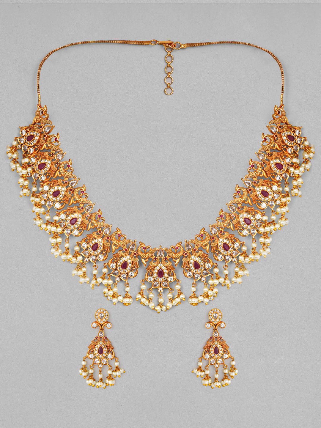 Gold Plated Handcrafted Ruby Stone with Pearls Traditional Necklace Set  Exude the royal vibe