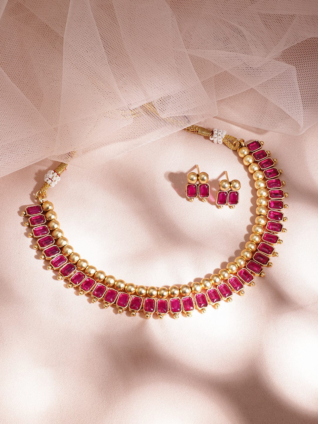 Gold-Plated Brass Red Stone Studded Necklace Set  organic chemicals