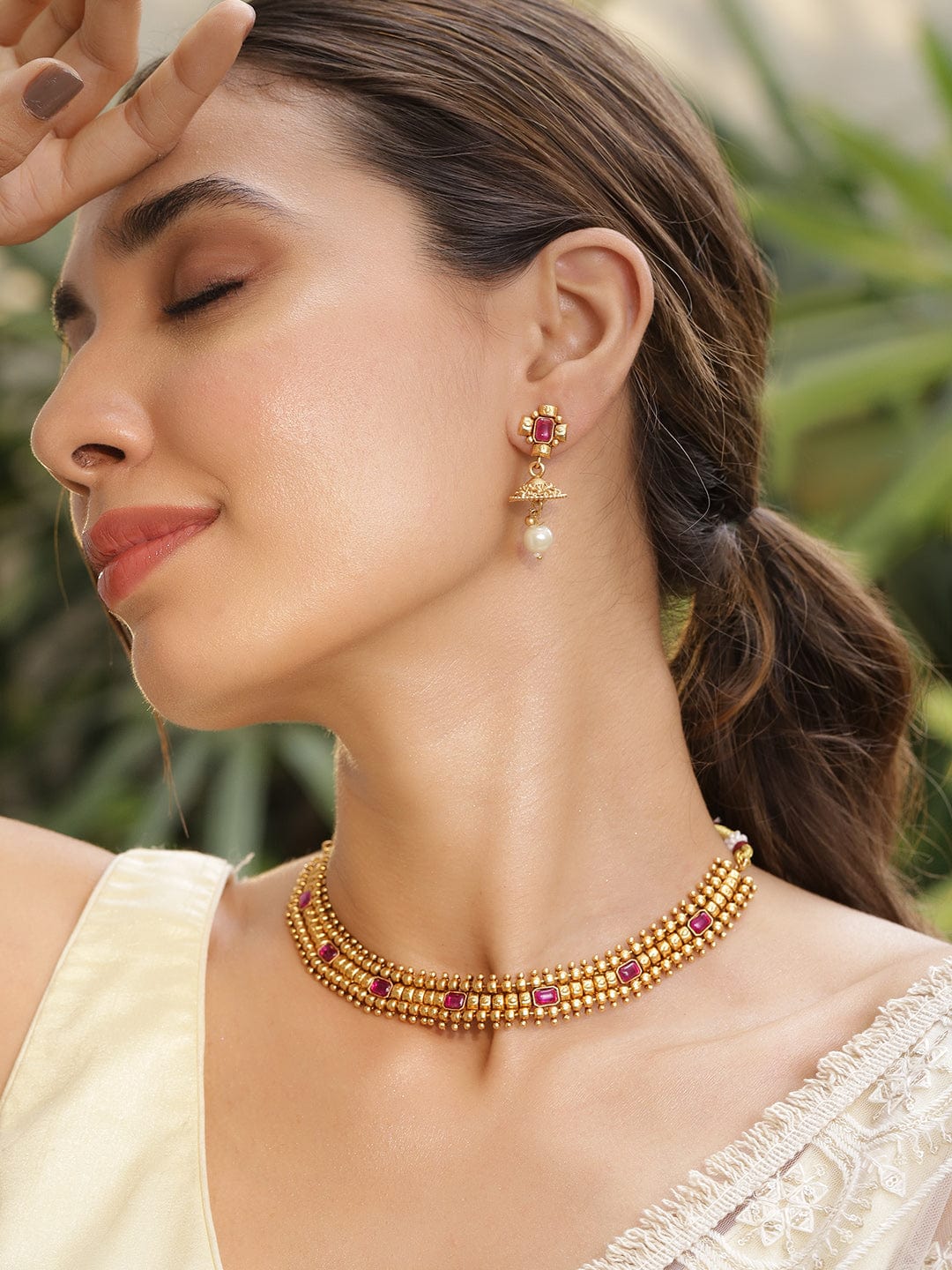 Gold Plated Brass Red Stone Studded Pearls Hanging Layered Necklace Set whole new level with this handcrafted piece