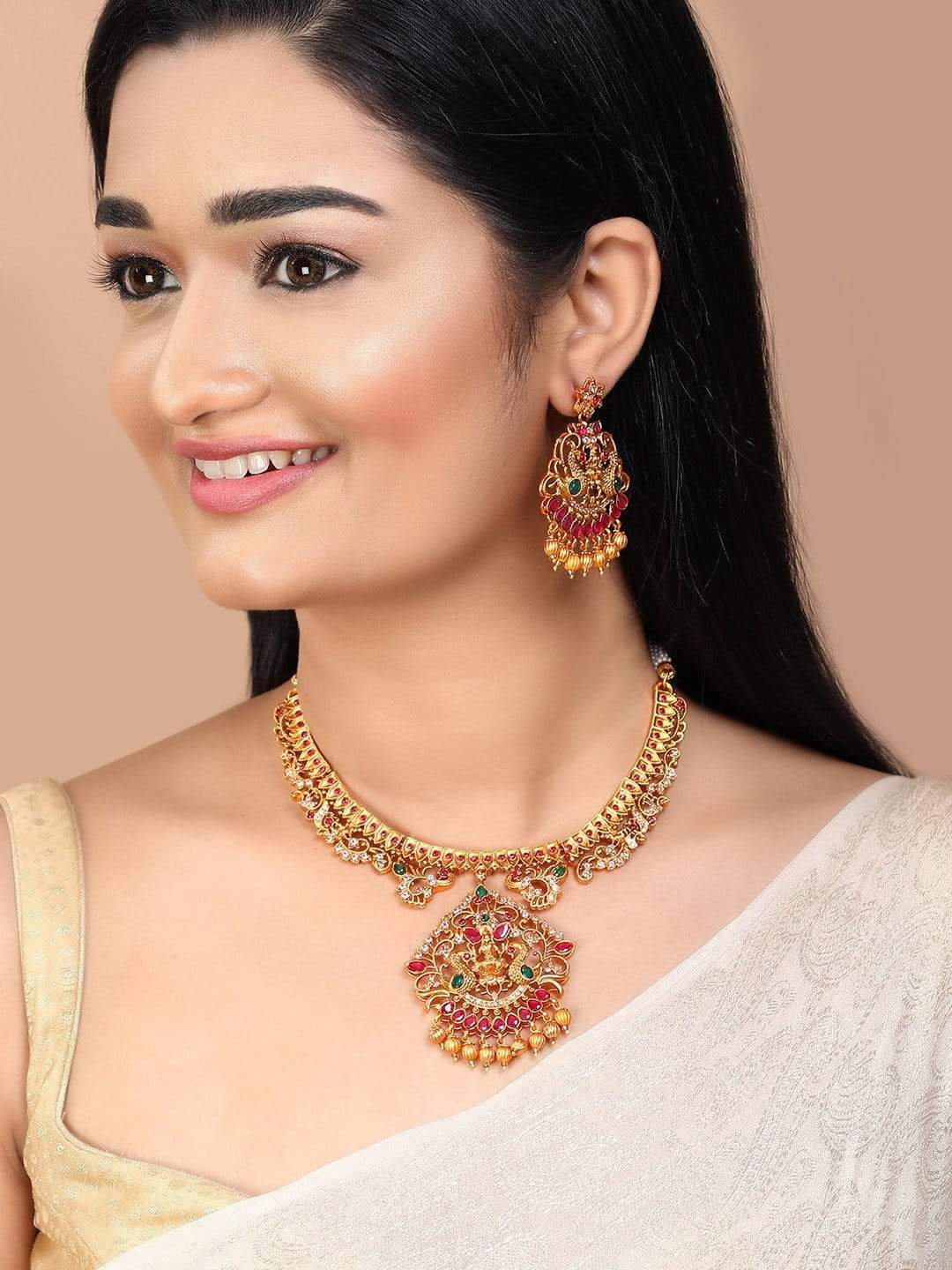 Gold Plated Color Stone Temple Necklace Set After use, wipe the jewellery