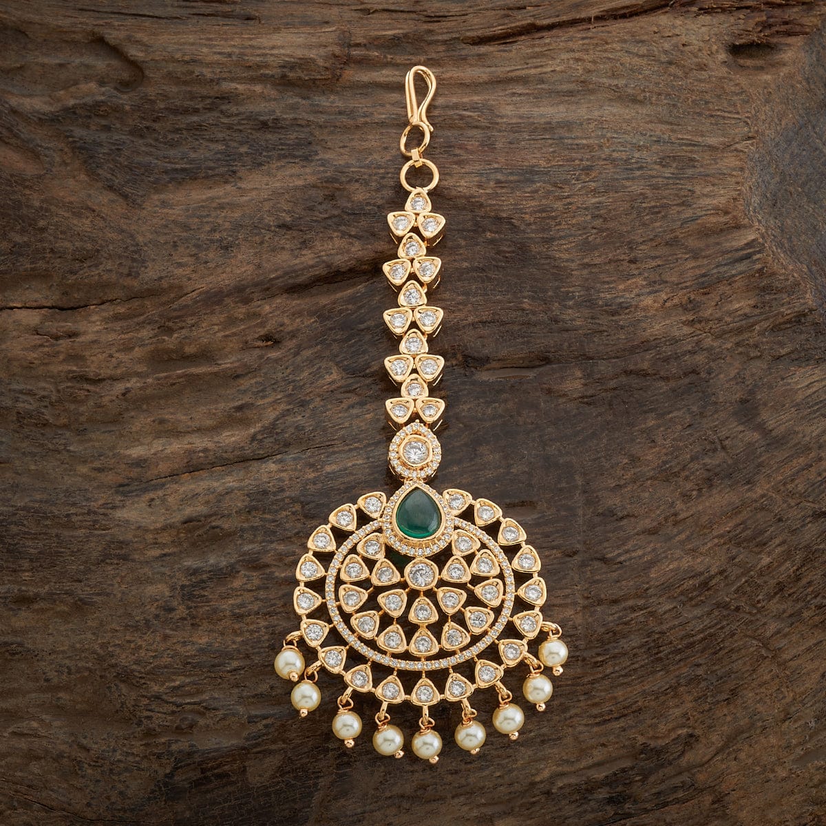 Zircon Tikka Adorn your forehead with this exquisite