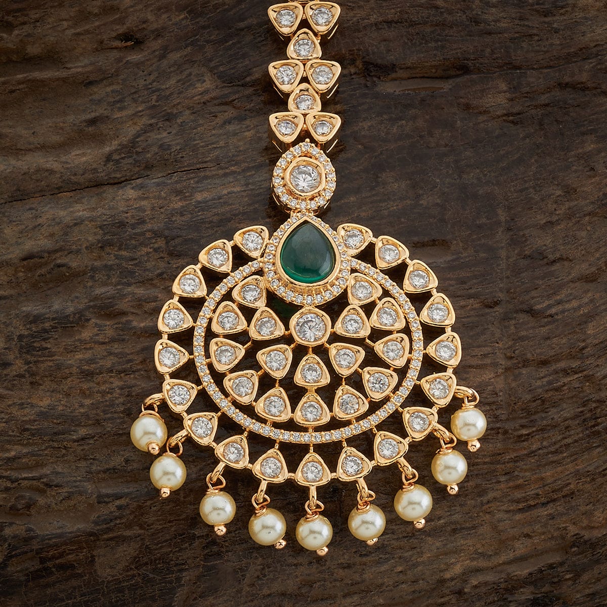 Zircon Tikka Adorn your forehead with this exquisite